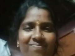 Tamil horny aunty showing her boobs with audio